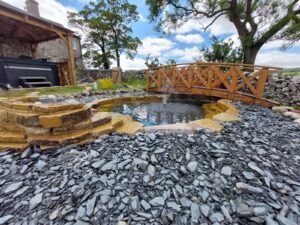 Pond Stonework and Bridge with fountain and sprinkler