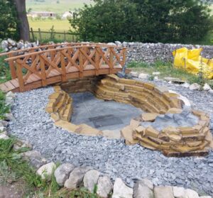 Pond with Bridge and Stonework