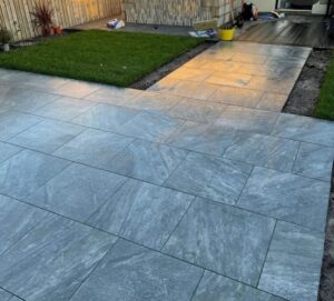 Tiled Patio Grey Slate with new Turf complete