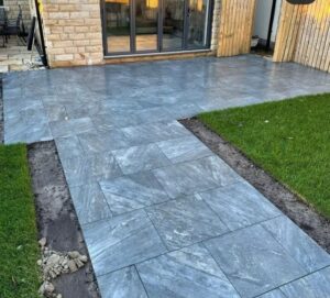 Tiled Patio Grey Slate with new Turf